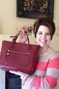 Rebecca Turner proudly displays her new Coach bag!