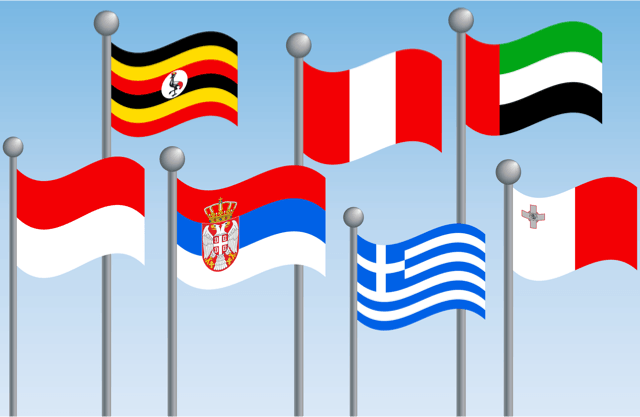 Seven country flags waving in the wind