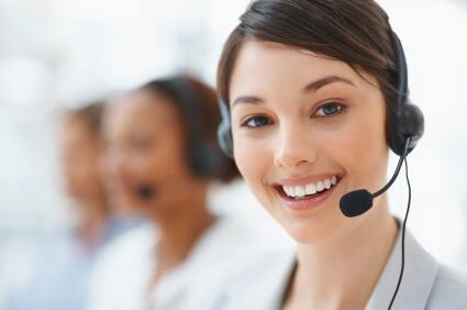 A female customer service rep with a phone headset on