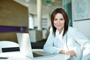 Shot of a businesswoman working at a laptop in an office