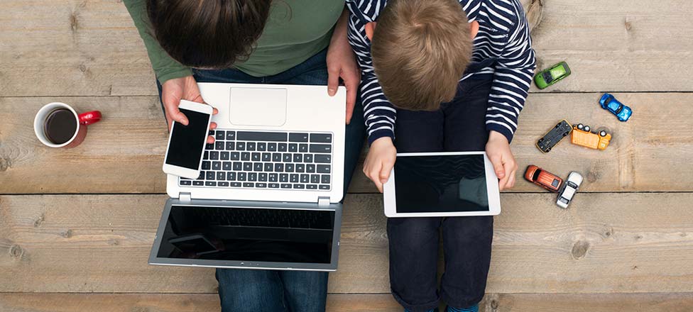 Parent and child working from home