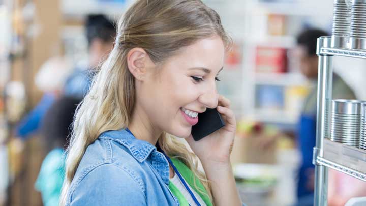 Young woman smiling on the phone